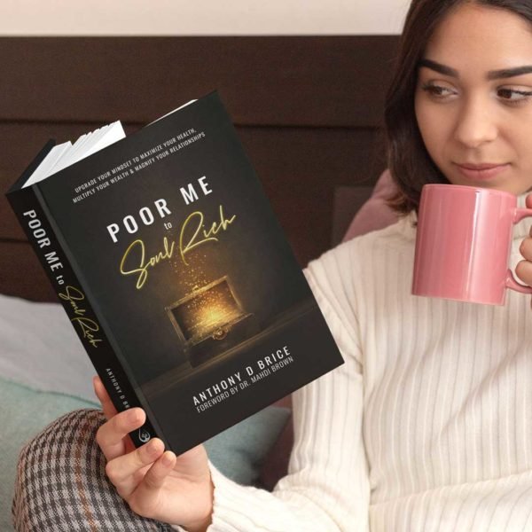 woman reading poor me to soul rich book