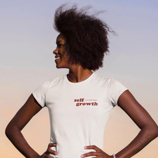 woman wearing a self growth is my superpower tshirt